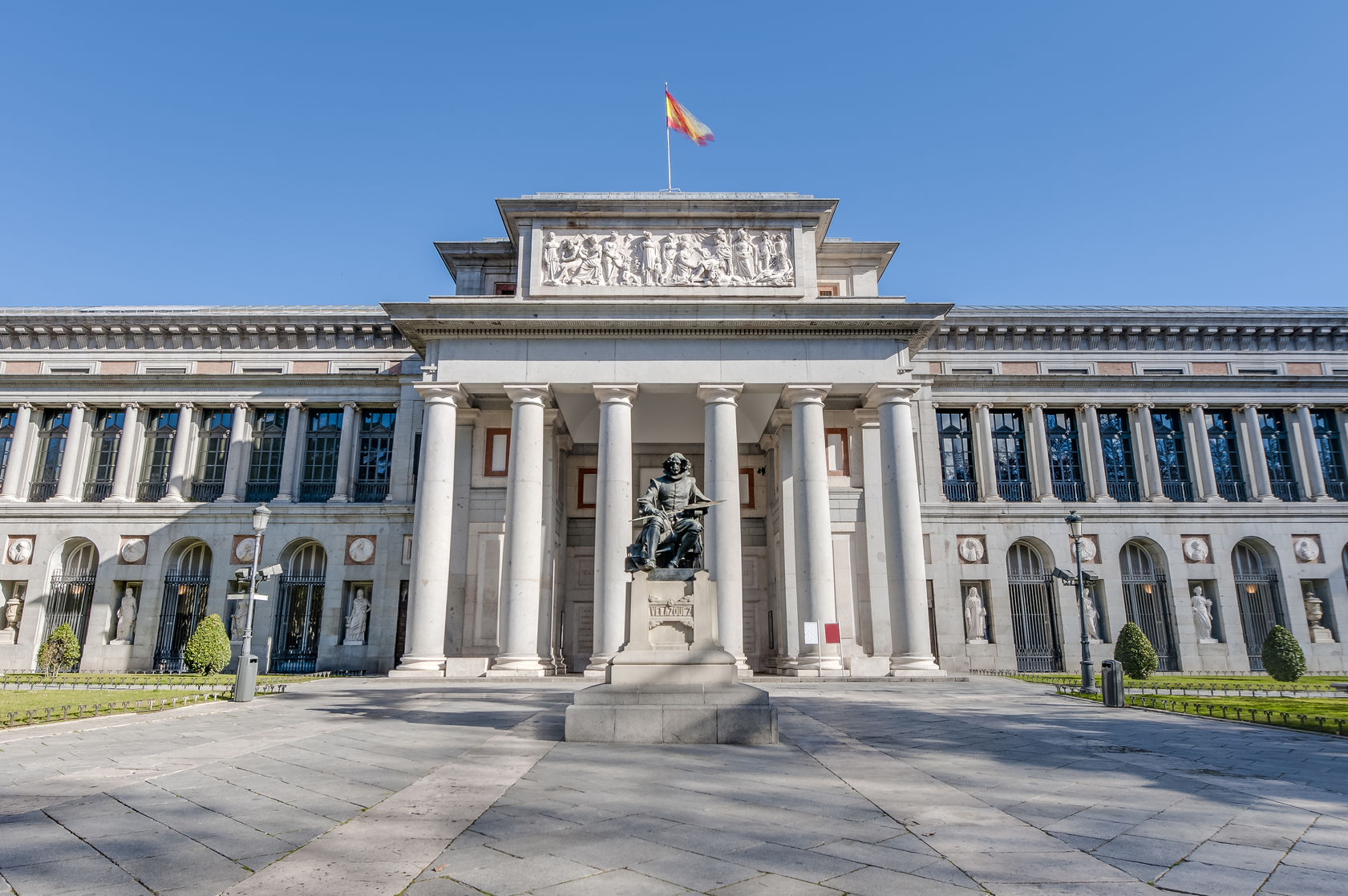 35360191 - prado museum facade and cervantes statue in madrid, spain
